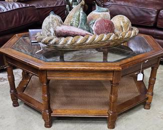 Octagonal coffee table with caned bottom shelf