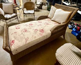Vintage, traditional coastal-style wicker chaise lounge