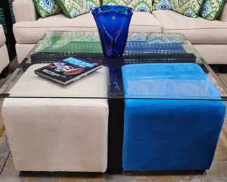 Great coffee table and pull-out extra seating in fun colors!