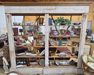 Amazing custom shelving unit full of great finds!