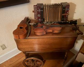 Wagon wheel bar cart; vintage instruments