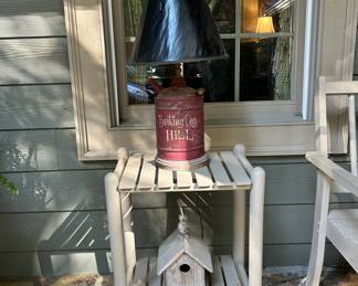 Repurposed vintage gas can lamp, wooden birdhouse, side table