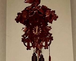 Vintage Black Forest carved wood cuckoo clock, bird crest