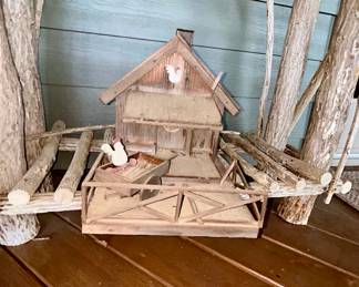Rustic wooden farmhouse birdhouse with chicken figures