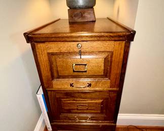 Oak two-drawer file cabinet with locking key - $95