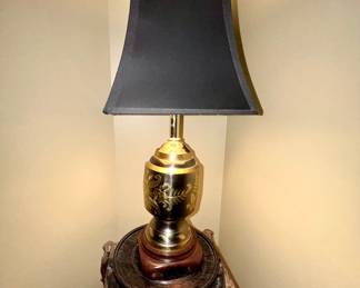 Brass table lamp, black shade, gold floral accents