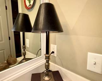Brass candlestick table lamp with black shade