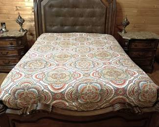Ashley North Shore wood and upholstered queen bed with mattress set