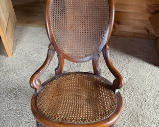 antique early 1900s walnut rocking chair