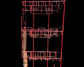 a vintage red multi-tier wire store display rack, commonly used for merchandising snacks, cereal, or general retail goods