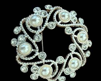 vintage Napier Silver-Tone Pearl Wreath Brooch featuring a twisted rope design accented with faux pearls and clear rhinestones