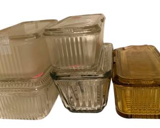 vintage glass refrigerator storage dishes, commonly produced during the Depression era by makers like the Federal Glass Company or Hazel-Atlas.