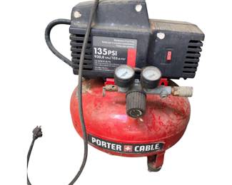 red and black Porter-Cable pancake air compressor