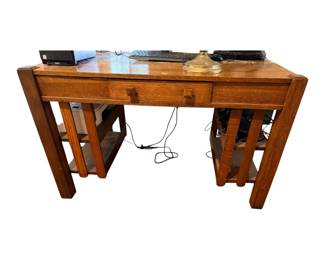 antique Mission-style oak writing desk with built-in side bookcases