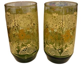 5 vintage mid-century modern avocado green drinking glasses with a raised, textured floral and paisley pattern highlighted in gold produced by the Libbey Glass Company during the 1960s or 1970s