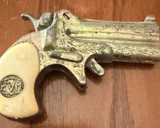 vintage miniature toy or novelty Derringer pistol manufactured by FVM in Italy
