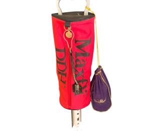 vintage red Maxfli DDH golf shag bag or practice carrier with a Dunlop handle.