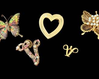 Several vintage pins