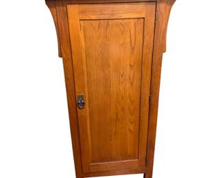 Mission-style oak cabinet produced by Kincaid Furniture as part of their Arts & Crafts revival collections