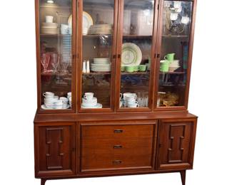 vintage mid-century modern wooden china cabinet or hutch with glass upper doors and carved cabinet accents/1960’s
