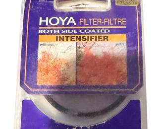 vintage Hoya Intensifier Filter (also known as a Didymium filter), which is designed to boost red, orange, and brown tones while reducing certain types of artificial light pollution.