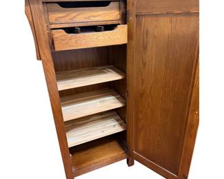Mission-style oak cabinet produced by Kincaid Furniture as part of their Arts & Crafts revival collections