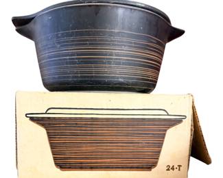 vintage Pyrex Terra pattern Cinderella casserole dish (model 24-T / 475, 2.5-quart) featuring a matte black finish with brown/tan concentric stripe details from the mid-1960s With original box