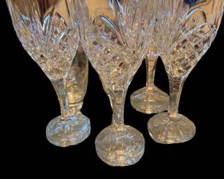 This is a set of four  Godinger Shannon Dublin Crystal Water Goblets featuring an intricate diamond-cut pattern and an 8-inch height.