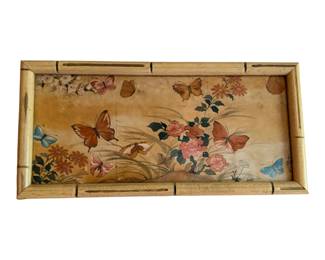 printed floral and butterfly scene set within a faux-bamboo wooden frame.