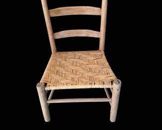 This is a primitive buggy chair