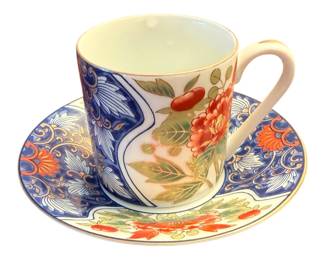 a vintage Japanese porcelain demitasse cup and saucer featuring a colorful Imari-style floral and cobalt blue pattern with gold trim. 4