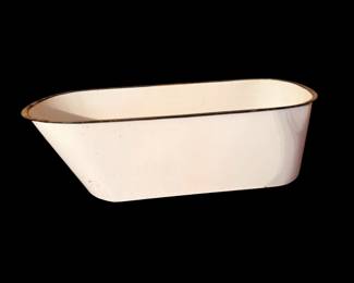 vintage white porcelain enamel baby bath or wash tub with a dark rim.