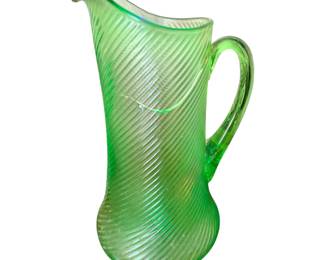 This ribbed uranium glass picture has a crack, but it is still a good display piece/This is a vintage 1929 Federal Glass Company green uranium depression glass lemonade pitcher in the Corded Optic Spiral pattern