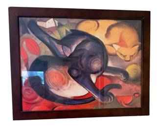 a framed art print of A cat by German expressionist painter Franz Marc.