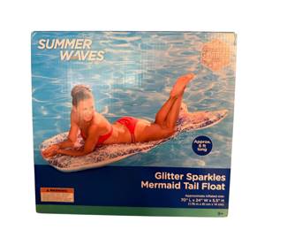 New in box mermaid tail float