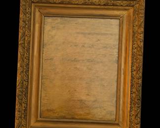 a vintage, ornate wooden picture frame
