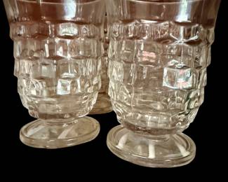 These juice glasses are  Colony American Whitehall Cubist Footed Tumblers made by Indiana Glass
