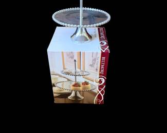This is a new in box two-tier silver-plated or metal dessert/pastry stand with a beaded edge from the Biltmore for Your Home collection.