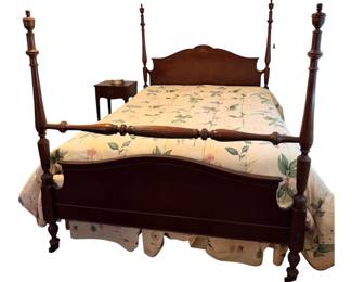 vintage dark wood four-poster bed frame and bed side table