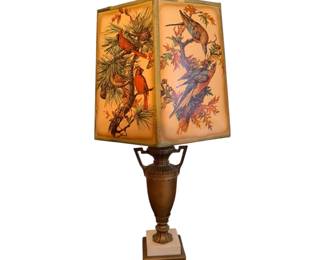a vintage electric table lamp featuring a classic urn-shaped metal base and a paneled shade decorated with colorful bird prints