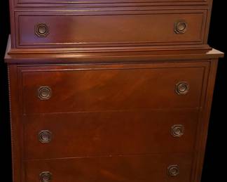This is a vintage mahogany two-piece highboy