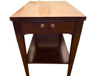 a vintage Mersman Federal/Neoclassical-style mahogany side or end table featuring a single drawer, a lower shelf, and brass casters, typically produced in the mid-20th century/pair