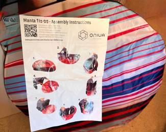 This is a sun shelter.  Only used once!! Folds up into this nice easy to transport carrier. 