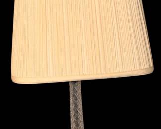 This vintage table lamp features a cut-crystal and brass columnar design with a pleated cream shade.