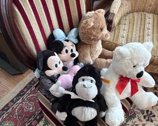 stuffed friends including a Steiff gorilla and Mickey and Minnie Mouse