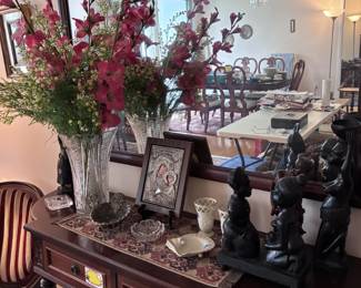 Entryway table, mirror and other treasures including a silver and wood icon from Italy