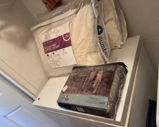 Sleep Number pillow, Eddie Bauer rain gear