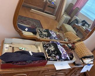 dresser, scarves, ties, gloves and handmade textiles