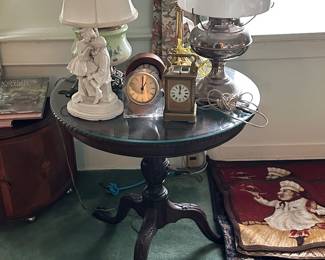Antique round table we have a matching pair