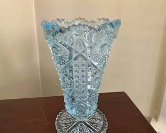 Vintage blue pressed glass vase with diamond pattern and scalloped rim